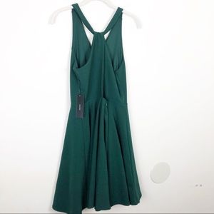 wonder whirl dark green twist back skater dress